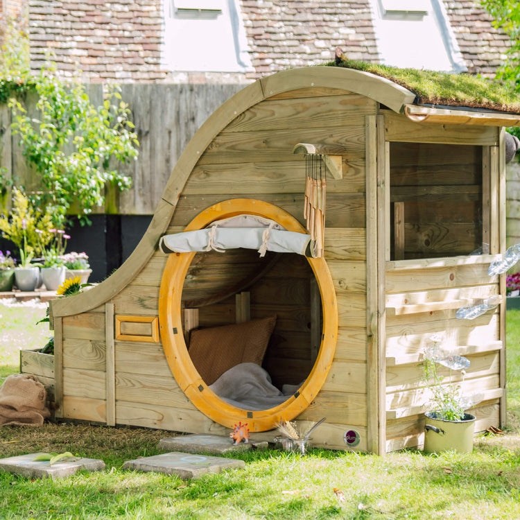 Plum Discovery Nature Play Hideaway with kitchen shelf